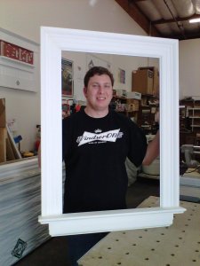 Dan "sample man' Hetzer getting his Huttig poster frames on!!